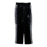 BLACK LAMINATE TRACK PANTS