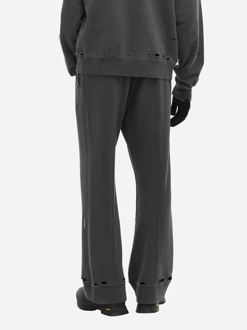 STAFF UNIFORM ASYMMETRIC AGITATOR DISTRESSED SWEATPANTS